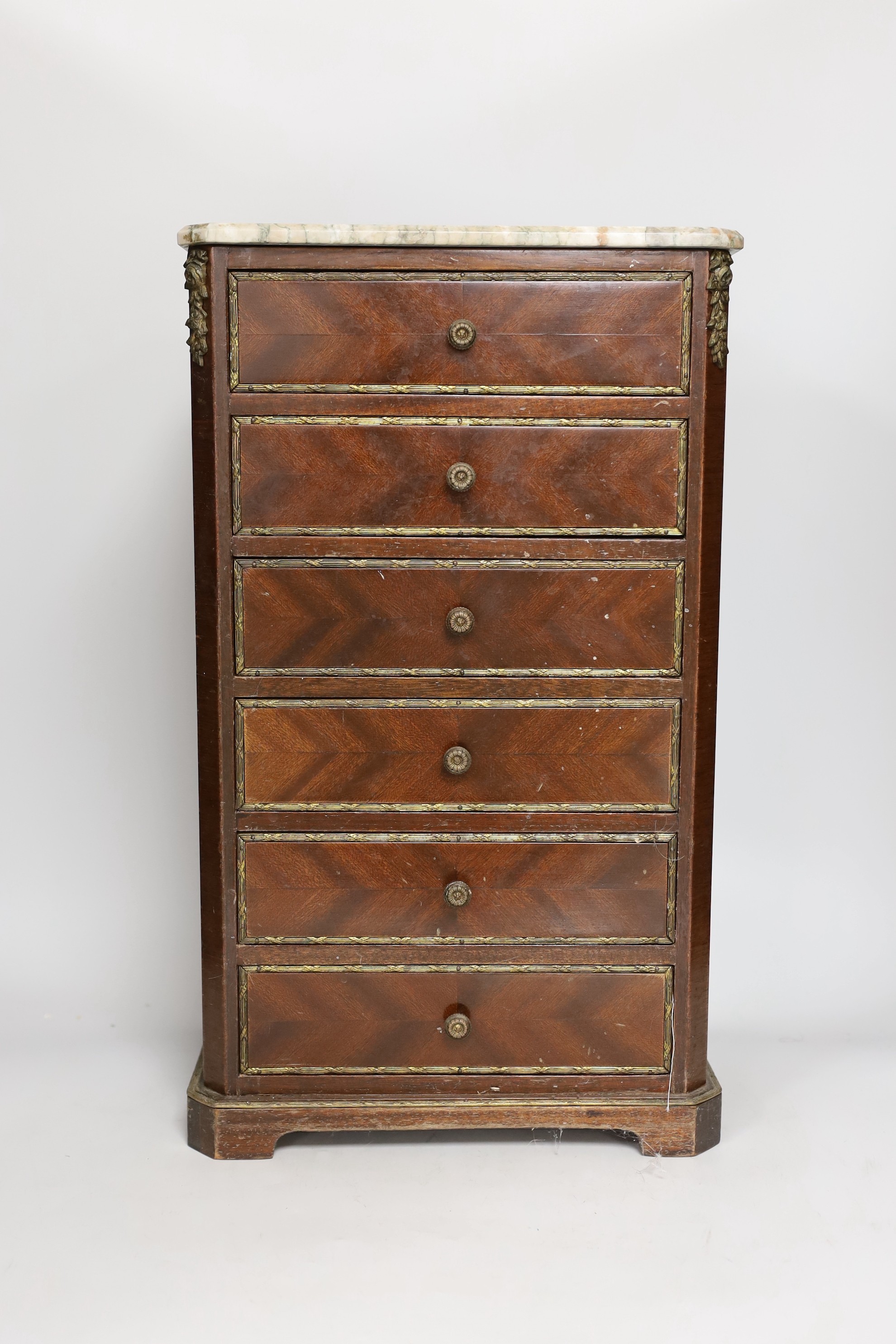 A 20th century French style miniature marble top six drawer chest, possibly an apprentice piece, 46.5cms high